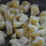 Roasting potatoes with salt, pepper and thyme